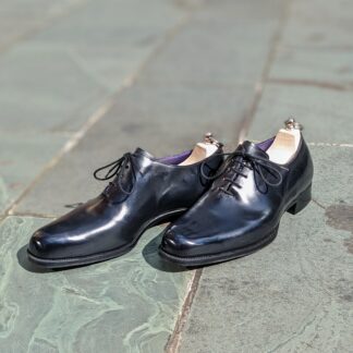 black wholecuts in box calf leather